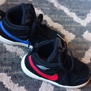 Jordan high top tennis shoes black with red and blue size 7c